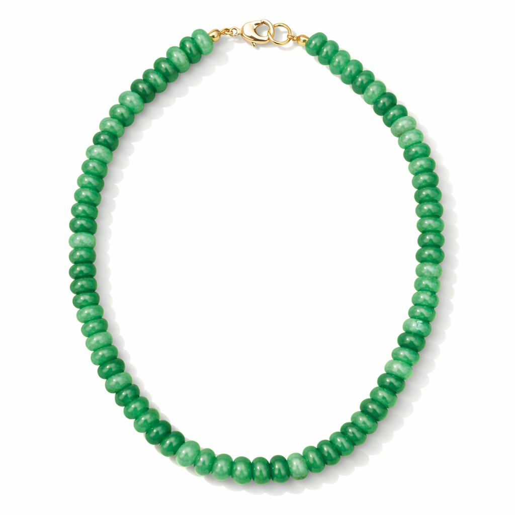Green beaded necklace with a gold clasp on a white background